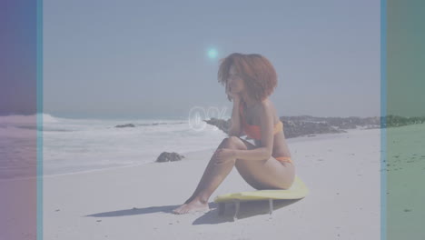 woman sitting on surfboard at beach with progress animation overlay