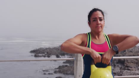 Caucasian-woman-working-out-on-the-docks