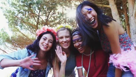 female friends having fun at music festival 4k