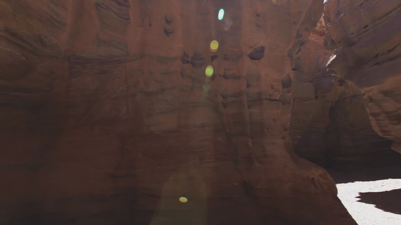 Arid red canyon, sun flare, Israel desert, wide angle shot