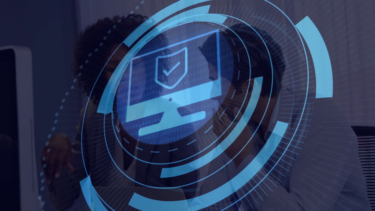 In office, digital security animation overlaying professionals working on computers