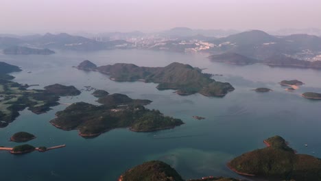 Aerial-shot-of-Sai-Kung,a-back-garden-of-Hong-Kong,with-fishing-villages,-beautiful-scenery,-hiking-trails,-beaches-and-islands,-geological-formations
