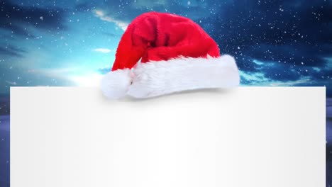 Animación-De-Tarjeta-En-Blanco-Con-Espacio-Para-Copiar-Y-Gorro-De-Papá-Noel-Sobre-Nieve-Cayendo-Y-Paisajes-Invernales