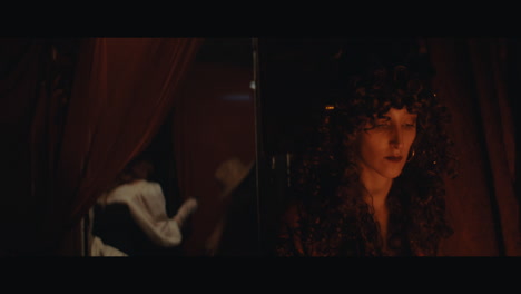 a gypsy lady shuffles the tarrot cards