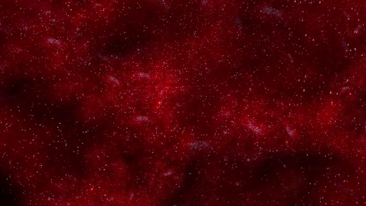 Glimmering red surface with delicate white spots