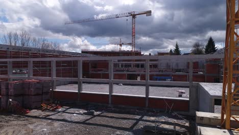 Building-Construction-With-Cranes-Aerial-View