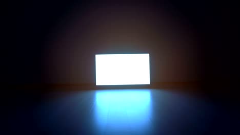 the television with white screen in a dark room