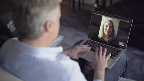 middle aged couple enjoying video talk to each other