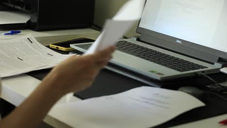 documentation being checked at desk