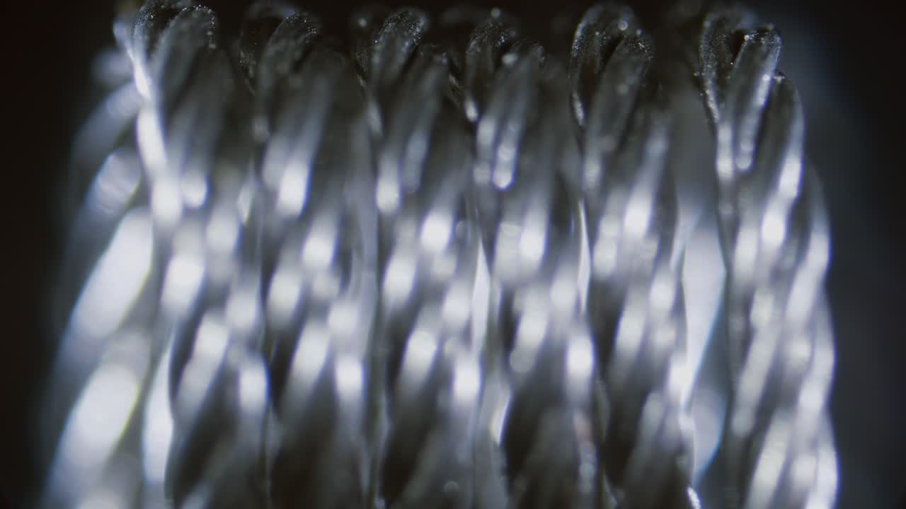 Vape RDA coil, mesh close-up under microscope