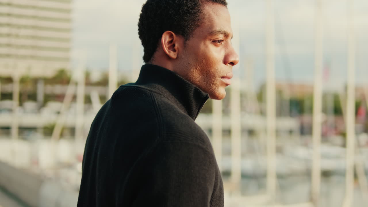 Close-up of Thoughtful Young Man Looking at Marina