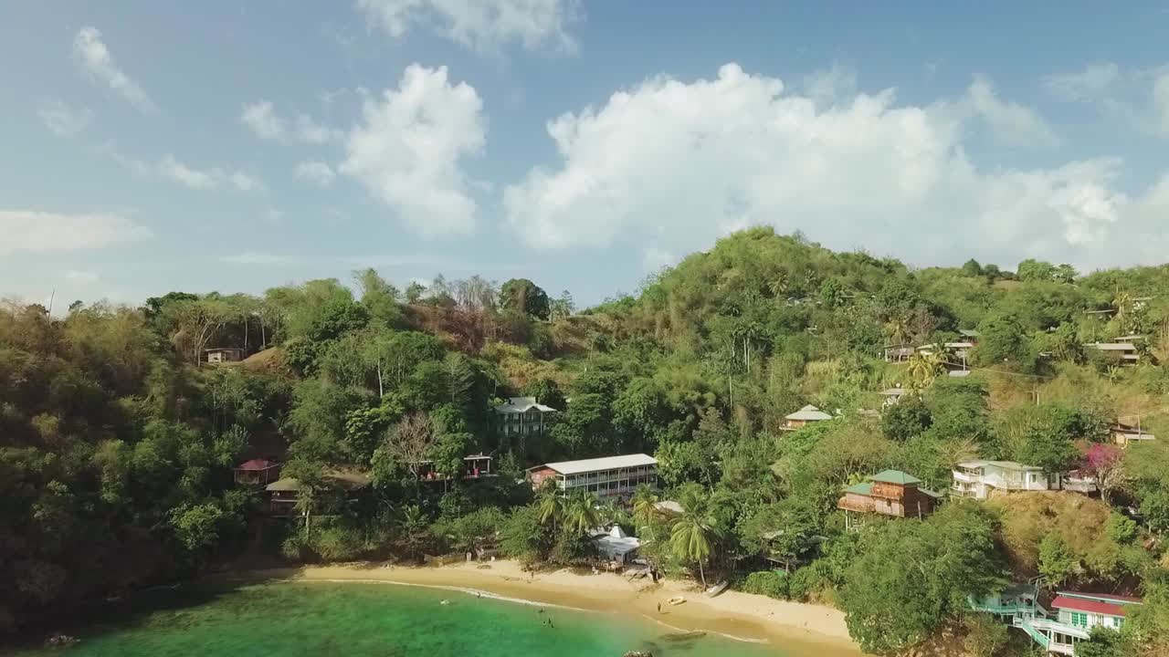 Beautiful view overlooking a fishing village and ocean bay in Tobago