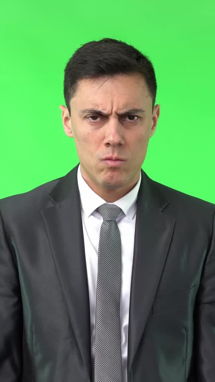 Angry Businessman Pouting on Green Screen