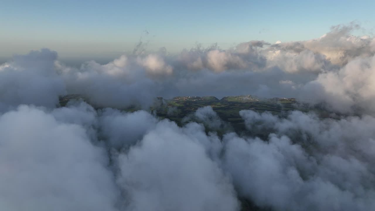 Azores coastline and landscape through the clouds.