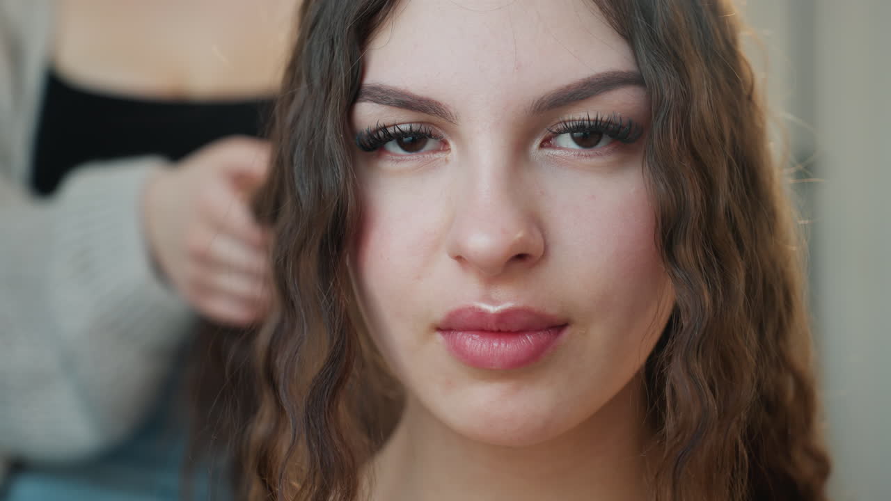 Graceful Look With Curly Waves, Sophisticated Individual Exhibits Polished Curls And Gentle Smile, Poised Persona Radiates Elegance Through Carefully Styled Curly Hair And Charming Expression