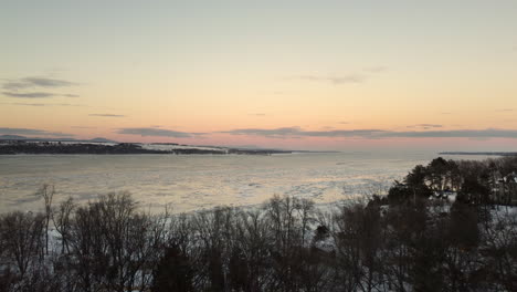 Aerial---Flying-towards-the-St-Lawrence-river-at-sunset-1