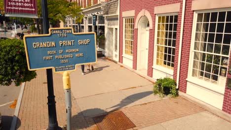 shot of a landmark sign at eb grandin downtown palmyra new york