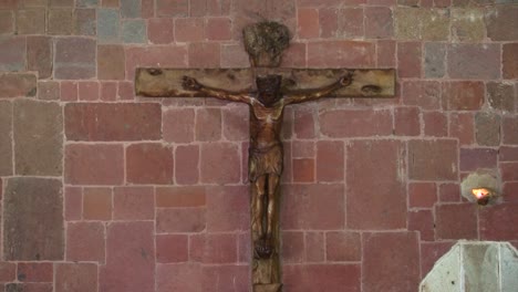 jesus crucified on the cross, inside notre dame cathedral in taiohae, nuku hiva, french polynesia