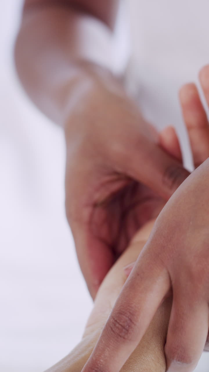 Close-up of Hands Receiving a Soothing Hand Massage