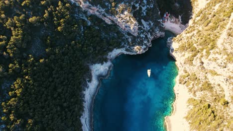 A-drone-shot-of-the-beach-Stiniva-cove-beach-of-Adriatic-sea,-Vis-island,Dalmatia,-Croatia