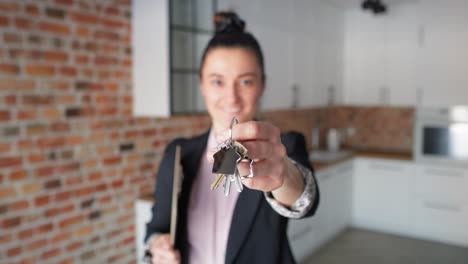 Video-portrait-of-real-estate-agent-holding-house-key