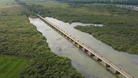 Aerial-drone-view-of-the-old-historical-railroad-bridge-in-the-Netherlands,-Europe