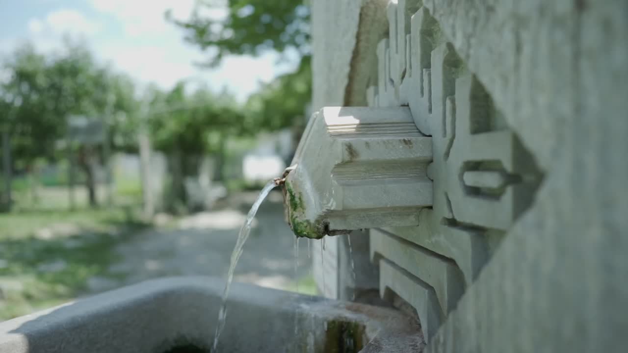 Close-up shot of a thermal mineral spring water source at St. Petka, believed by visitors and pilgrims to possess healing powers to heal the sick, located in Rupite, Petrich, Bulgaria.