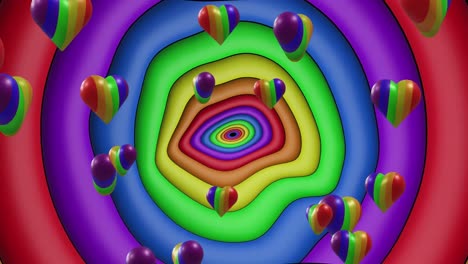 animation of rainbow hearts over rainbow circles and colours moving on seamless loop