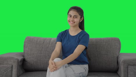 Happy-Indian-teenage-girl-smiling-to-the-camera-Green-screen