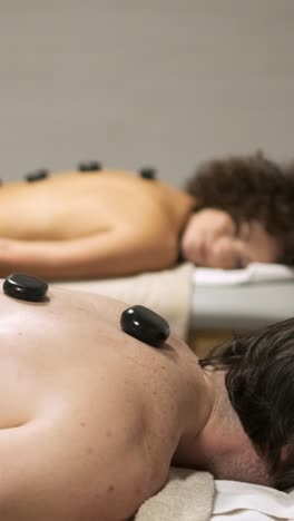 series of 6 pictures of people getting massages. vertical