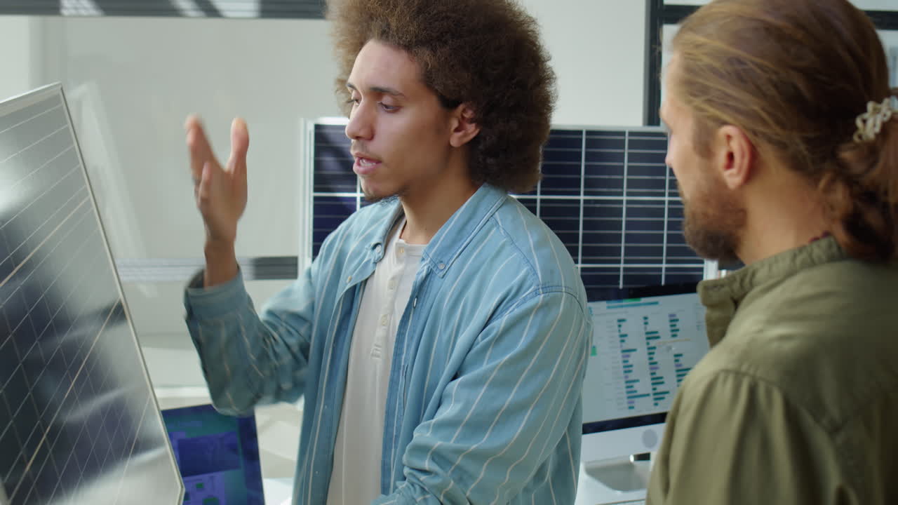 Renewable Energy Developer Telling about Solar Panel to Colleague