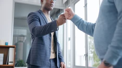 Business-men,-hands-and-fist-bump-in-an-office