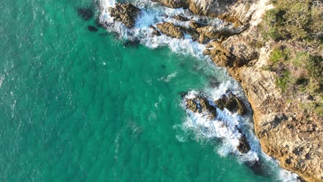 Top-down-Static-Drone-shot-of-Stradbroke-Islands-Rocky-Coast-Line