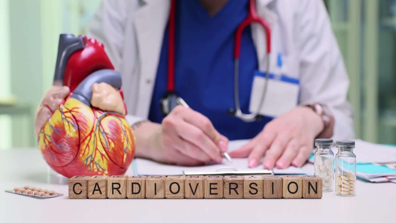 Woman cardiologist carefully studies test results of patient