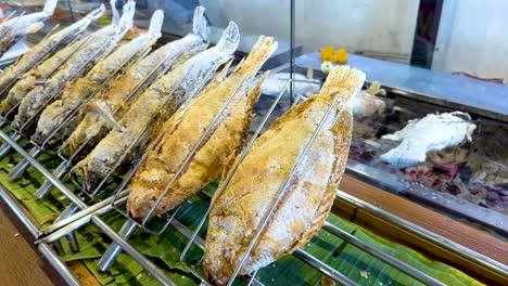 fish grilling at khlong lat mayom market