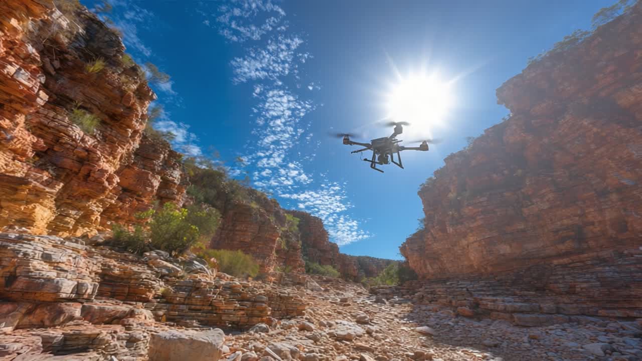 A Drone Captures Stunning Aerial Views of a Breathtaking Canyon Landscape Under a Brilliant Sky, Showcasing Nature's Beauty and Advanced Technology