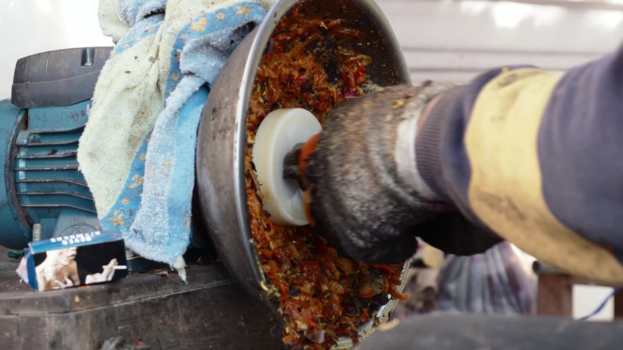 Persimmon fruit peeling machine, Person working on handmade machine, Vietnam