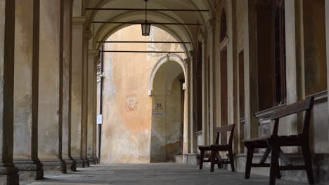 Long-Porticos-Chapel-with-windows-at-the-Sacred-Mountain-of-Varallo,-a-christian-devotional-complex,-a-unesco-world-heritage-si-in-Italy