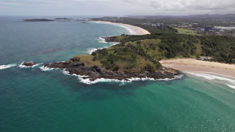 aerial shot of headland and diggers beach, coffs harbour, nsw, australia