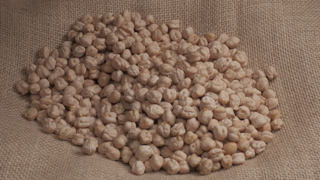 Dry chickpeas hand giving, Mediterranean food organic agriculture