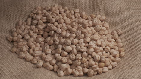dry chickpeas hand giving, mediterranean food organic agriculture