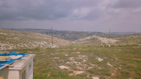 aerial of israeli landscape at west bank efrat 006 flyby drone over hut