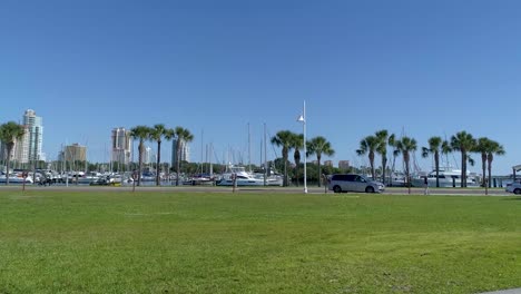 4k video of hot rod driving through waterfront park in st petersburg, florida