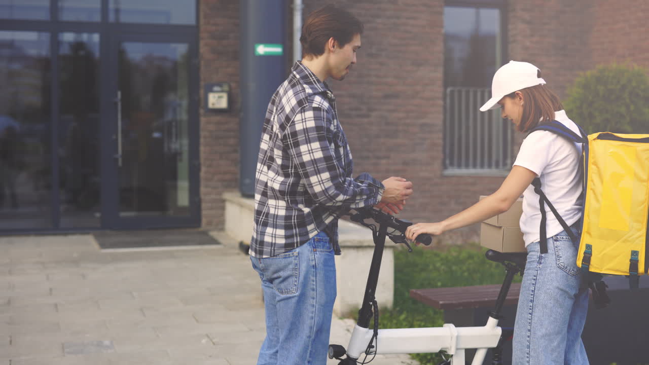 Food Delivery Person Giving Packages to a Customer
