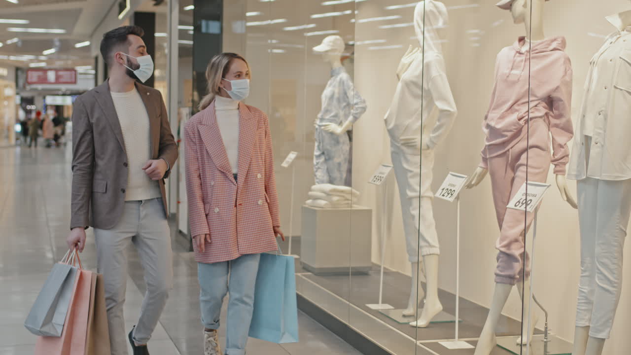Couple Shopping For Clothes During Coronavirus