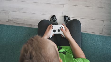 kid plays console