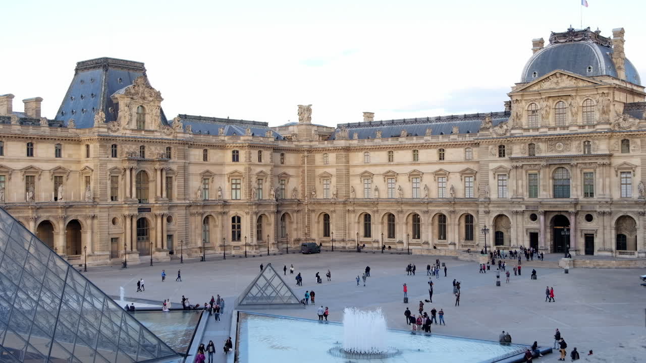 Paris, France - November 21, 2021: Front view of the Louvre Museum in daylight