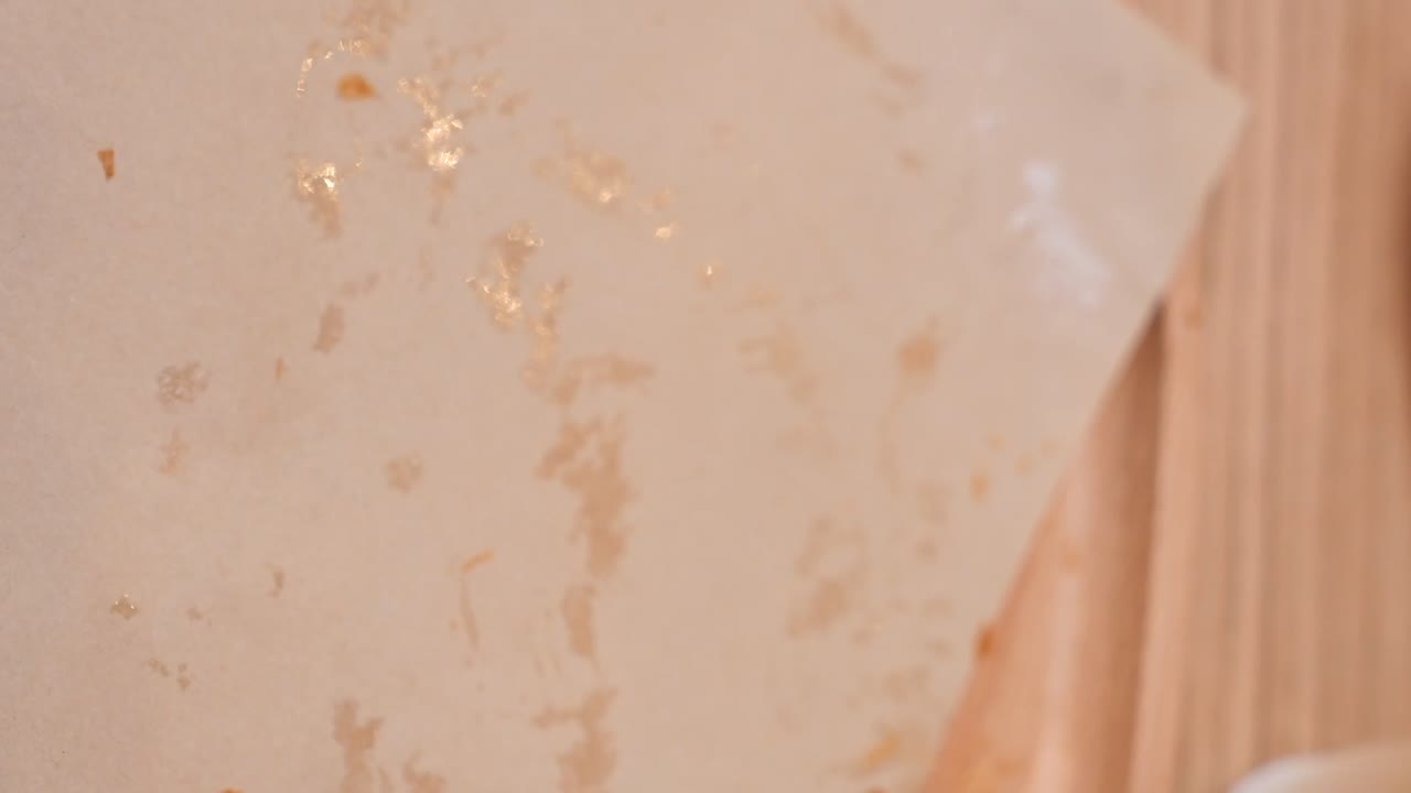 Hand holding a Croissant