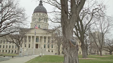 Kansas-state-capitol-building-in-Topeka,-Kansas-with-dolly-wide-shot-video-moving-left-to-right-in-slow-motion