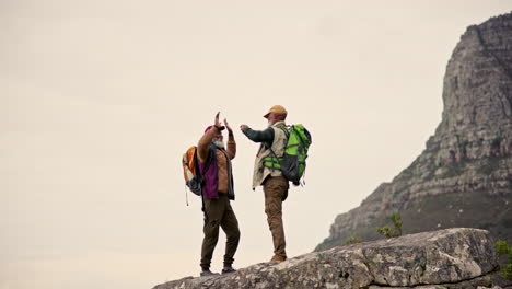 elderly men hiking on a mountain